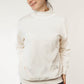 White nursing jumper with breastfeeding access and a comfortable fit.